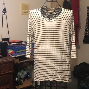 Cutee black and white striped shirt.